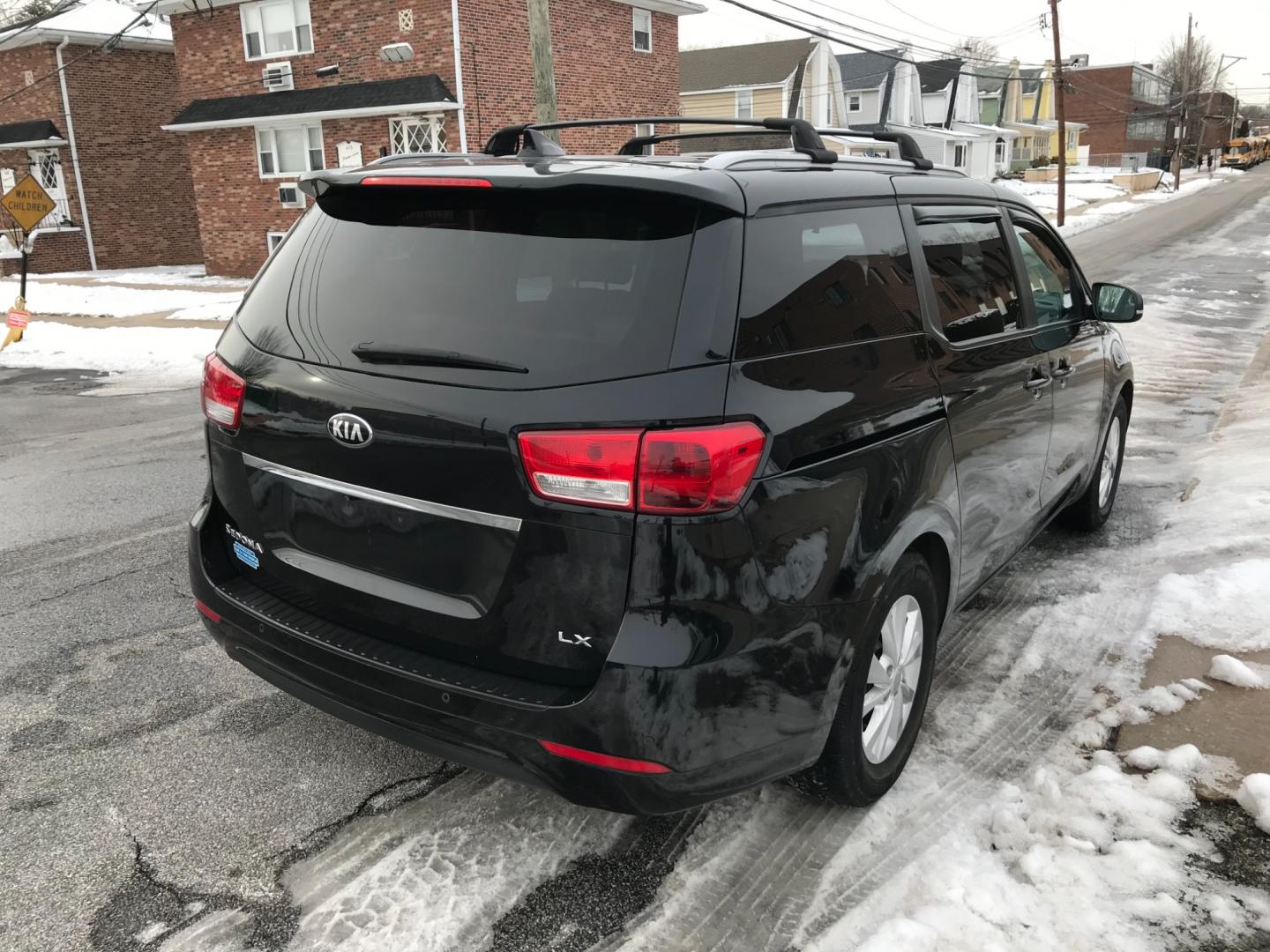 2017 Maroon /Tan Kia Sedona LX (KNDMB5C13H6) with an 3.3 V6 engine, Automatic transmission, located at 577 Chester Pike, Prospect Park, PA, 19076, (610) 237-1015, 39.886154, -75.302338 - Photo#4